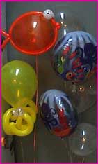 floating helium fishes octopus twisted balloons